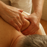 Close up of hands performing deep tissue massage