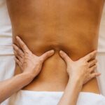 Close-up of a relaxing back massage promoting wellness and relaxation.